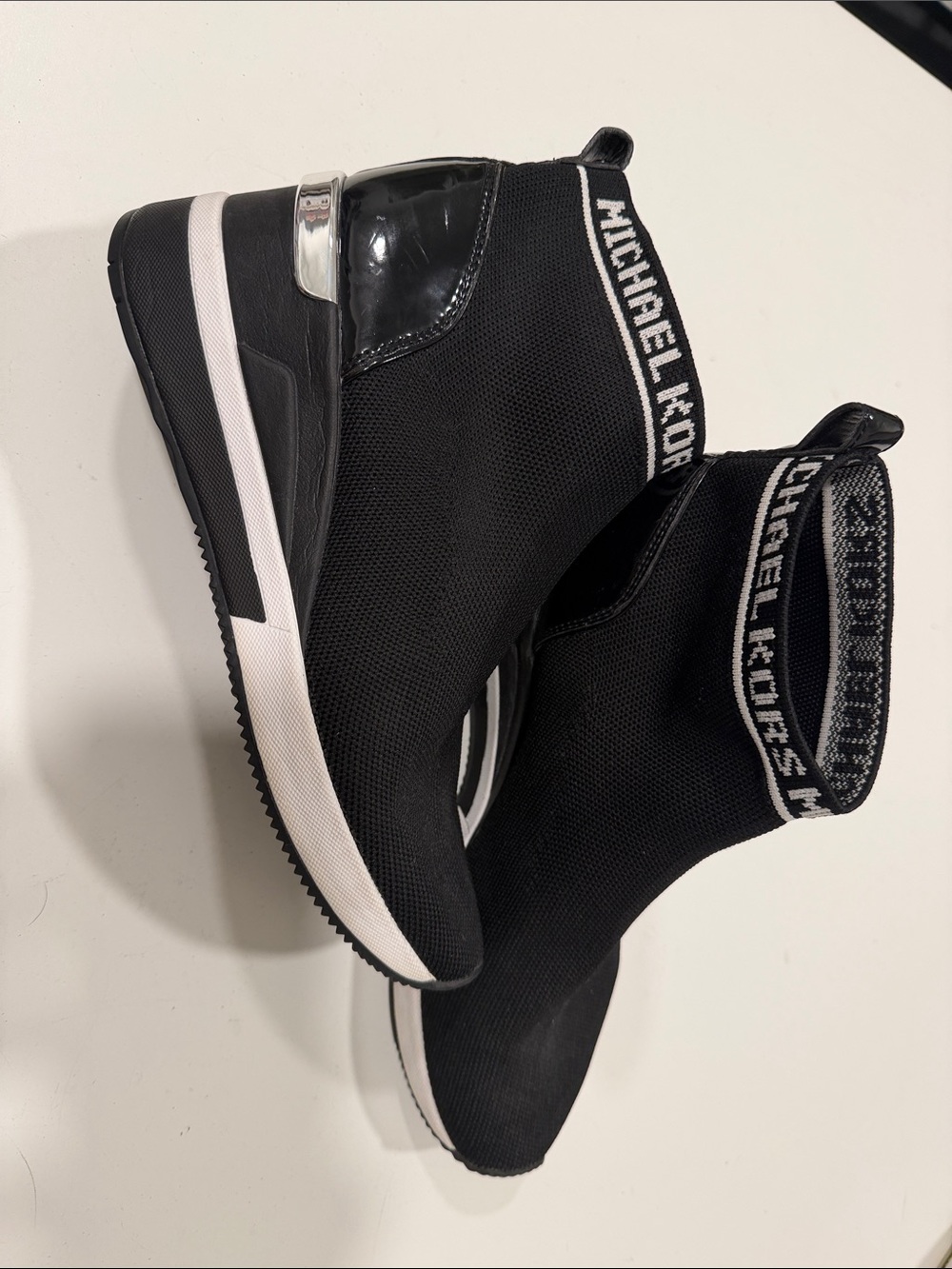 Michael Kors Black and White Knit Wedge Slip-On Sneakers